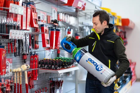 ALbee bottle held by a technician
